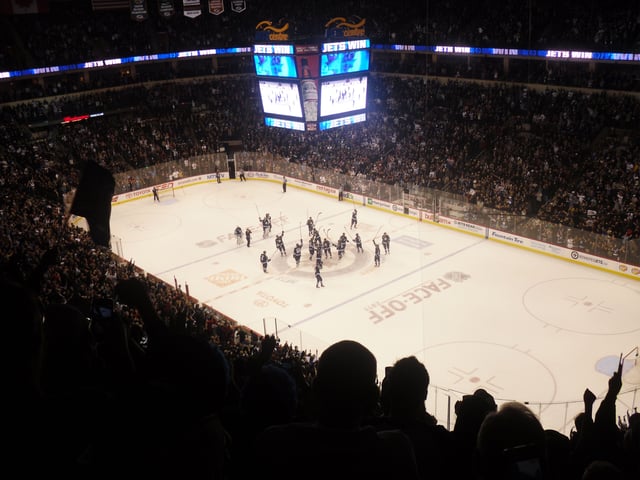 The Winnipeg Jets celebrate their first regulation win in Winnipeg at the MTS Centre on 17 October 2011