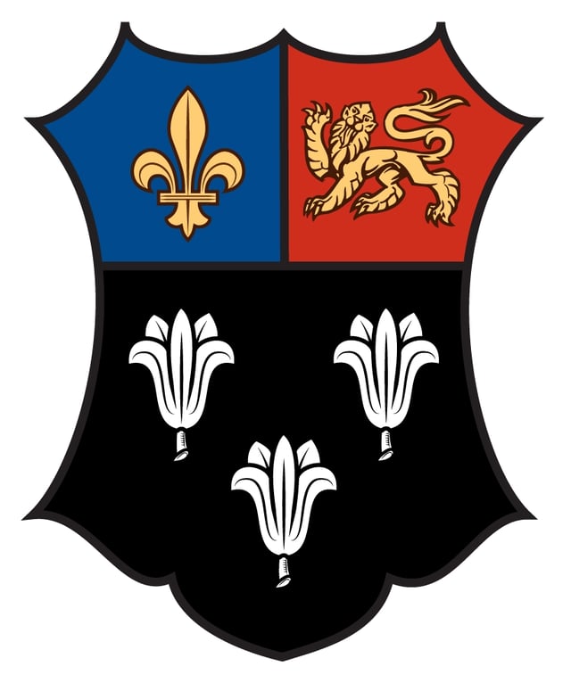 Arms of Eton College: Sable, three lily-flowers argent on a chief per pale azure and gules in the dexter a fleur-de-lys in the sinister a lion passant guardant or