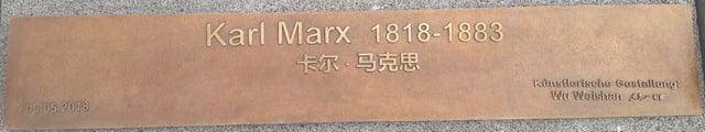 Karl Marx statue inscription
