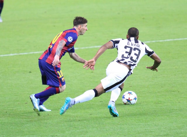 Messi dribbling past Juventus defender Patrice Evra during the UEFA Champions League Final in June 2015. Prior to the match, Juventus captain Gianluigi Buffon stated, “Messi is an alien that dedicates himself to playing with humans”.