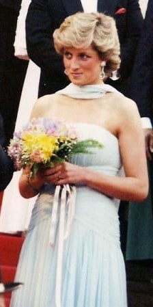 The Princess of Wales at the 1987 Cannes Film Festival. The strapless Catherine Walker dress, which was inspired by a dress worn by Grace Kelly in To Catch a Thief, is considered to be among the most iconic dresses worn at the festival throughout its history. It was later sold to Julien's Auctions for over £80,000.