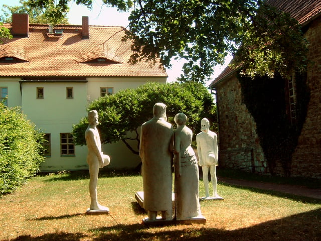 Nietzsche's grave at Röcken with the sculpture Das Röckener Bacchanal by Klaus Friedrich Messerschmidt (2000)