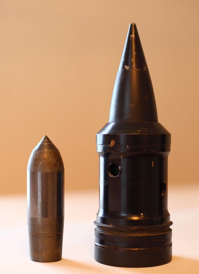 complete 17pdr Armour-Piercing Discarding-Sabot (APDS) shot and tungsten carbide core side by side