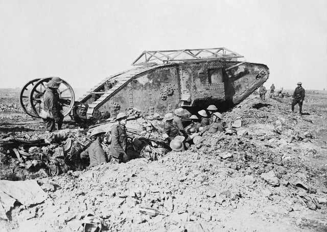 British First World War Mark I tank; the guidance wheels behind the main body were later scrapped as unnecessary. Armoured vehicles of the era required considerable infantry and artillery support. Ernest Brooks)