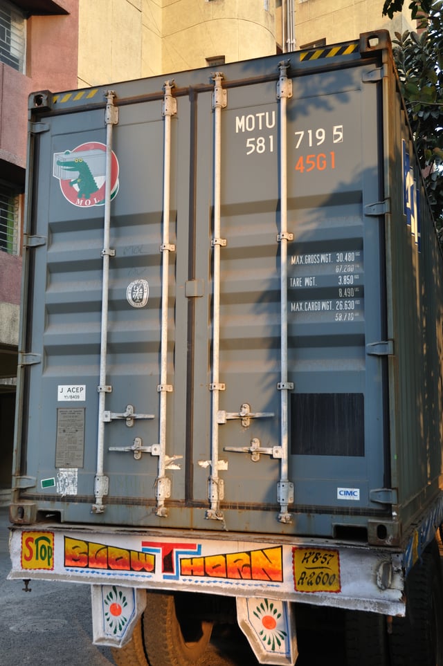 Various markings on the rear end of a container