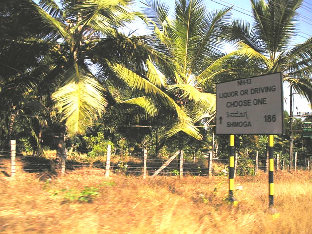 Road sign discouraging drinking and driving in Karnataka, India