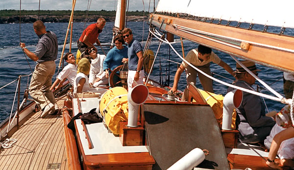 A young John Kerry (in white) aboard the yacht of John F. Kennedy, in 1962