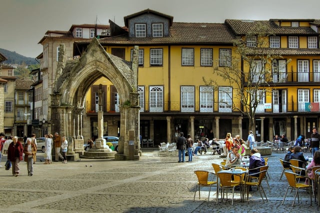 The Oliveira square, in the historical center of Guimarães, with the Padrão do Salado on the left
