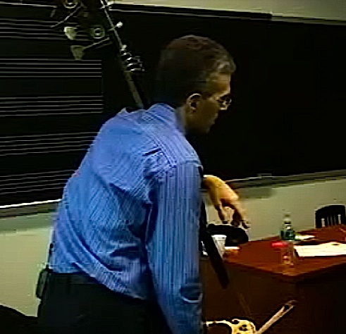 Manhattan School of Music professor Timothy Cobb teaching a bass lesson in the late 2000s. His bass has a low C extension with a metal "machine" with buttons for playing the pitches on the extension.