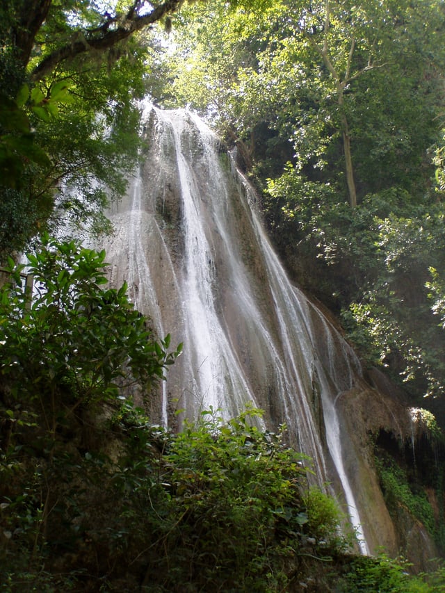 Cola de Caballo. Waterfalls are common in the forested mountain terrain surrounding the city