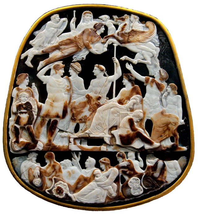 The deified Augustus hovers over Tiberius and other Julio-Claudians in the Great Cameo of France