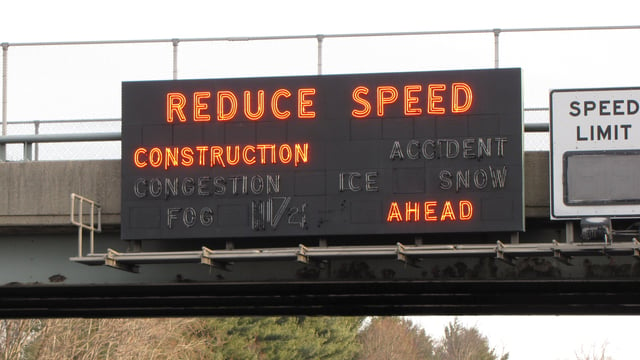 An older variable-message sign displaying a warning. These signs have since been replaced.