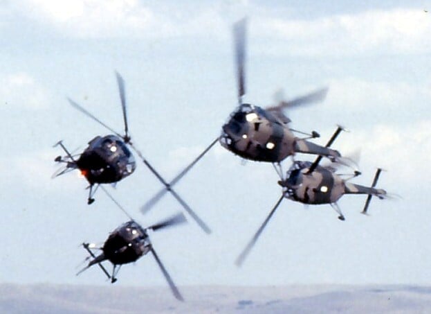 A flight of four Alouette IIIs performing an aerobatic display