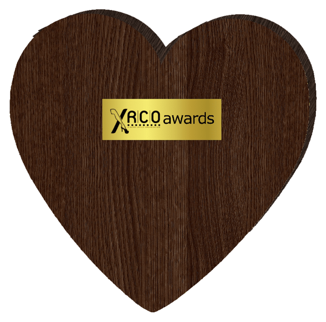 Original award plaques were made of wood in the shape of a heart and used until 2014