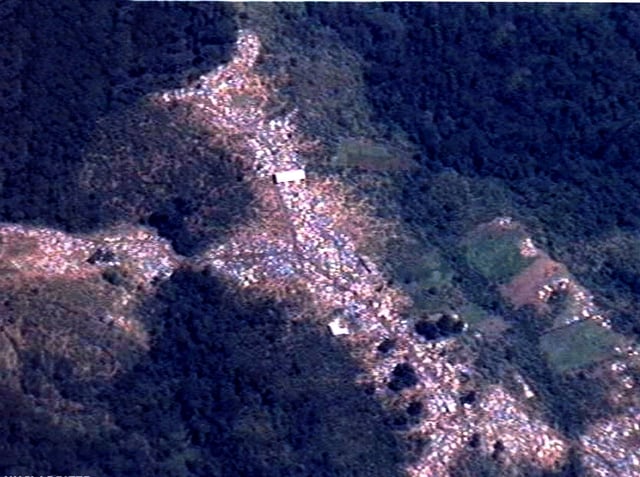 Aerial photograph of a Mihanda, Zaire refugee camp in 1996. Pictured are 500+ tents set up in the Mitumba Mountains.