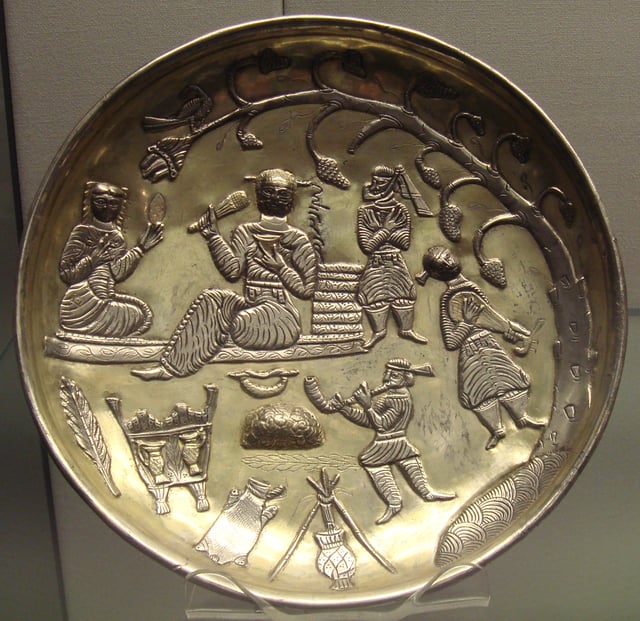Silver gilt dish of Tapuria, 7th–8th centuries. A tradition initiated under the Sasanians and continued after the Arab invasions. Anuzhad inscription in Pahlavi script, next to the reclining figure. British Museum