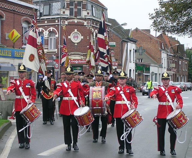 DWR Drums platoon lead the Regiment to Erquinghem Lys Town Hall to receive the Keys to The town.