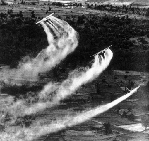Three US Fairchild UC-123B aircraft spraying Agent Orange during the Operation Ranch Hand as part of the overall herbicidal warfare operation called Trail Dust with the aim to deprive the food and vegetation cover of the Việt Cộng, c. 1962–1971.