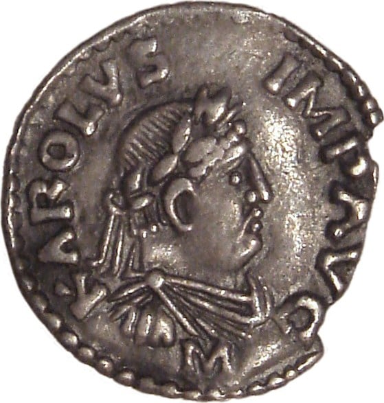 Denarius of Frankish king Charlemagne, who was crowned as Roman Emperor Karolus Imperator Augustus in the year 800 by Pope Leo III due to, and in opposition to, the Roman Empire in the East being ruled by Irene, a woman. His coronation was strongly opposed by the Eastern Empire.