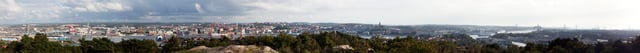 A panorama of central Gothenburg taken from Keillers park, facing south – from left to right: Göta älvbron, Lilla Bommen, Viking, The Göteborg Opera in front of Göteborgshjulet, Skansen Kronan, Oscar Fredrik Church, Masthugg Church, and Älvsborg Bridge