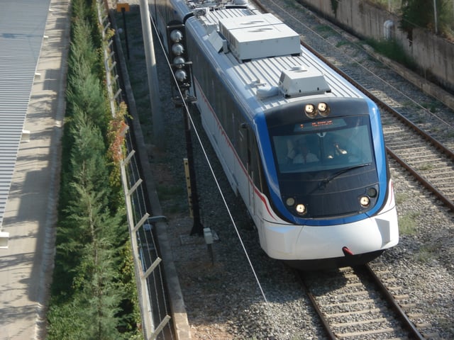 İZBAN commuter train heading towards Adnan Menderes International Airport