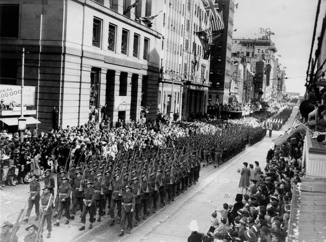 Returned World War II soldiers march in Queen Street, Brisbane, 1944