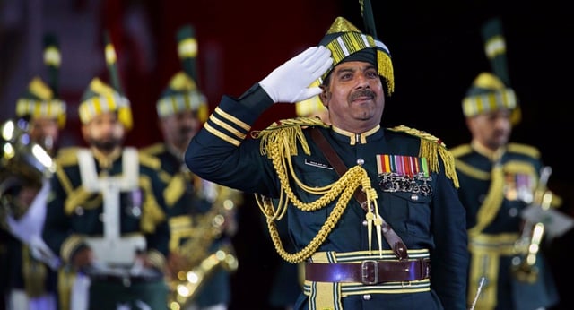 The Pakistan Army Music band's conductor saluting after the performance in the Russian Federation.