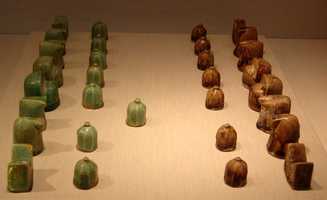 A Seljuq, shatranj (chess) set, glazed fritware, 12th century.