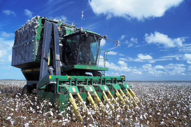 Mechanised agriculture: from the first models in the 1940s, tools like a cotton picker could replace 50 farm workers, at the price of increased use of fossil fuel.