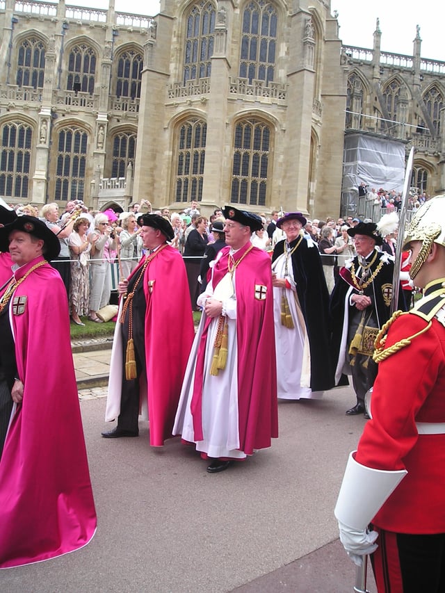 Officers of the Order of the Garter (left to right): Secretary (barely visible), Black Rod, Garter Principal King of Arms, Register, Prelate, Chancellor.