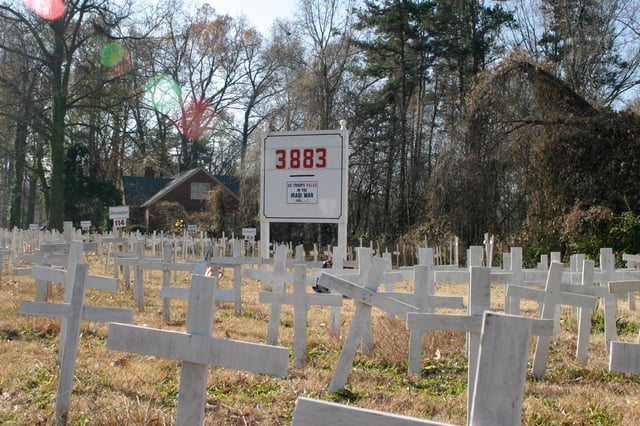 A memorial in North Carolina in December 2007; U.S. casualty count can be seen in the background.