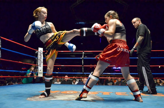 Muay Thai boxer delivering a kick