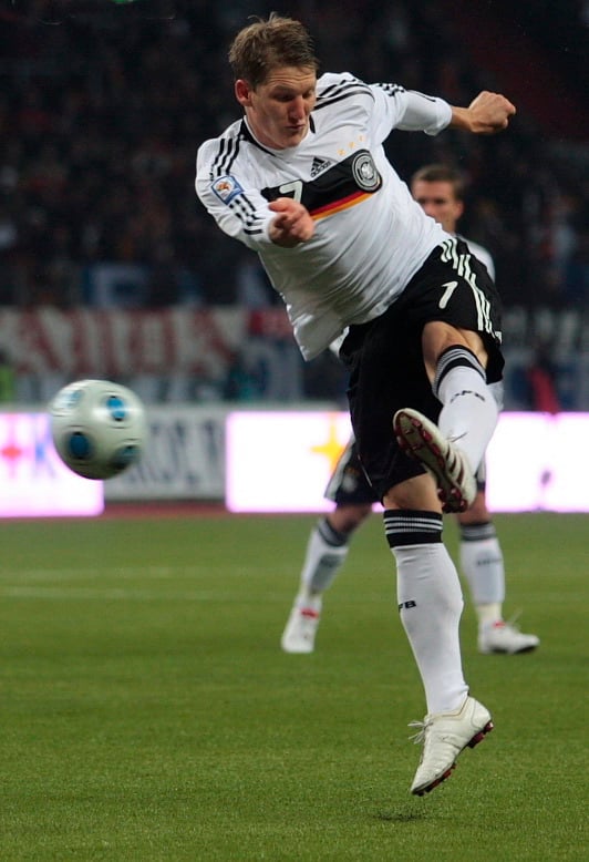 Schweinsteiger taking a shot for Germany in 2009