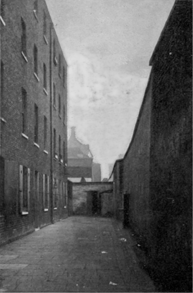 The Marshalsea around 1897, after it had closed. Dickens based several of his characters on the experience of seeing his father in the debtors' prison, most notably Amy Dorrit from Little Dorrit.