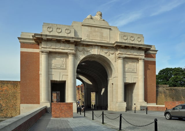 The race passes under the Menin Gate World War I memorial in Ypres during the race finale.