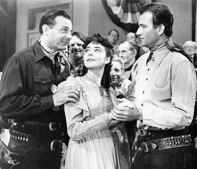 Ray Corrigan, Jennifer Jones, and John Wayne in New Frontier (1939)