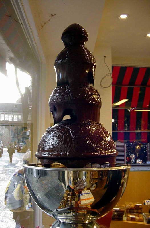 Fountain chocolate is made with high levels of cocoa butter, allowing it to flow gently over a chocolate fountain to serve as dessert fondue.