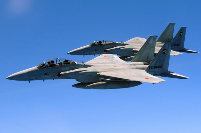 Japan Air Self Defense Force F-15DJ and F-15J of the 306th TFS