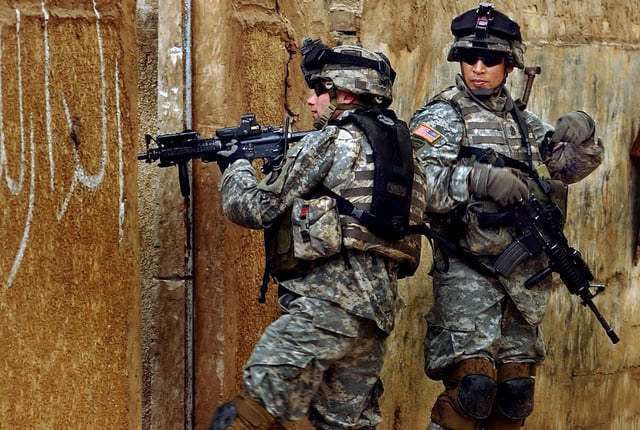 101st Airborne troopers on patrol with M4s in Sadr City, Iraq, c. 2006