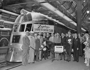 The passengers, including "Zeph" the burro, that rode the Zephyr on the "Dawn-to-Dusk Dash" gather for a group photo in front of the train after arriving in Chicago on May 26, 1934.