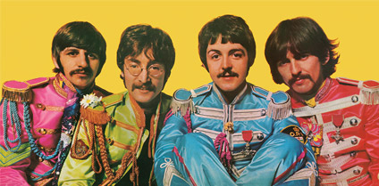 Sgt. Pepper's inner gatefold. McCartney (in blue) wears a badge on his left sleeve that bears the initials O.P.P. Proponents of the Paul is dead theory read them as O.P.D., which they interpret as "Officially Pronounced Dead". According to Martin the badge was a gift from a fan; the initials stand for "Ontario Provincial Police".