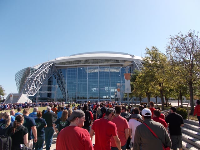 Several participants walk at the 2013 DFW MDA Muscle Walk; then known as Cowboys Stadium.