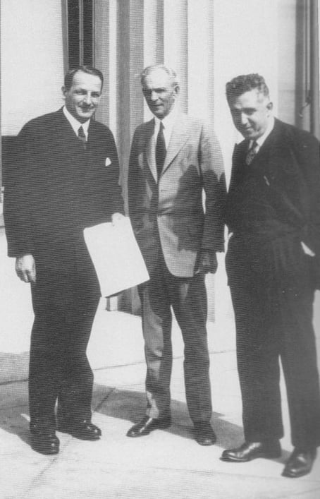 After signing the contract for technical assistance in building Nizhny Novgorod (Gorky) Automobile Plant. Dearborn, Mich., May 31, 1929. Left to right, Valery I. Mezhlauk, Vice Chairman of VSNKh; Henry Ford; Saul G. Bron, President of Amtorg.