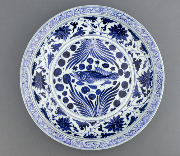 A Yuan dynasty blue-and-white porcelain dish with fish and flowing water design, mid-14th century, Freer Gallery of Art