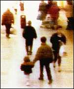The two-year-old James Bulger being led away by his killers, recorded on shopping centre CCTV in 1993. This narrow-bandwidth television system had a low frame rate.