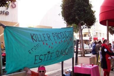 QUIT activists protesting Estée Lauder Companies, 2004.