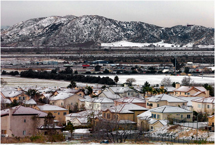 January snowfall in San Bernardino with Shandin Hills in the background. near Verdemont and the University District