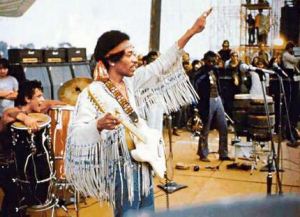 Hendrix flashed a peace sign at the start of his performance of "The Star-Spangled Banner" at Woodstock, August 18, 1969.
