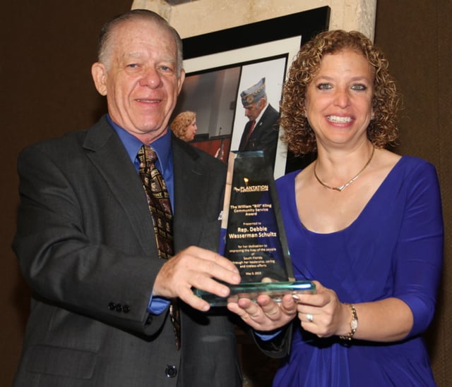 Debbie Wasserman Schultz receives award from Plantation Democratic Club President Marvin Quittner, May 5, 2013.
