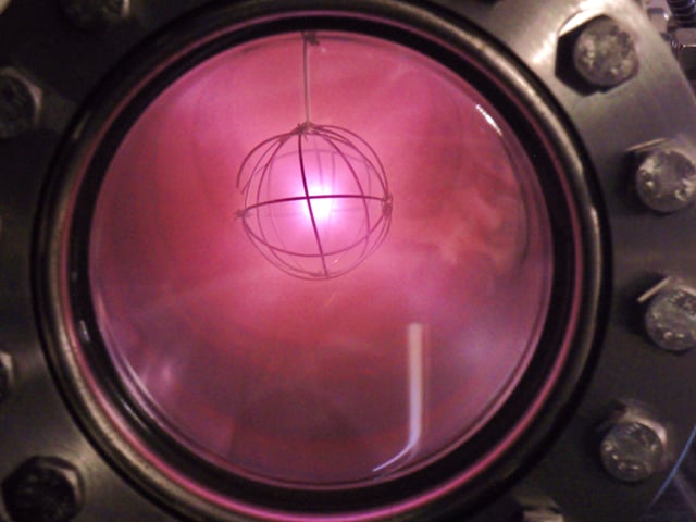 Ionized deuterium in a fusor reactor giving off its characteristic pinkish-red glow